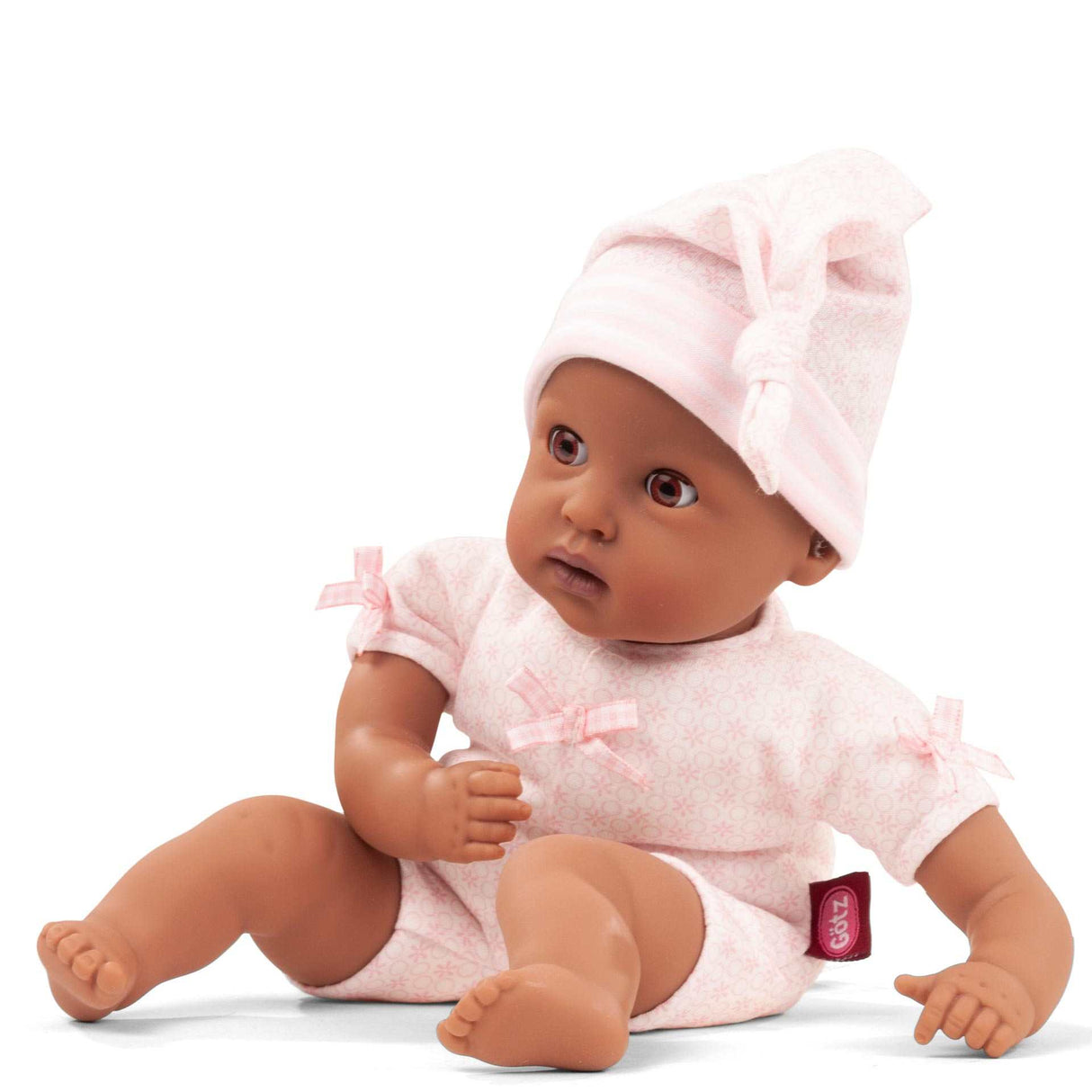 Muffin to dress soft-bodied baby doll with vinyl limbs and brown eyes from Götz Puppenwelt, 33 cm tall