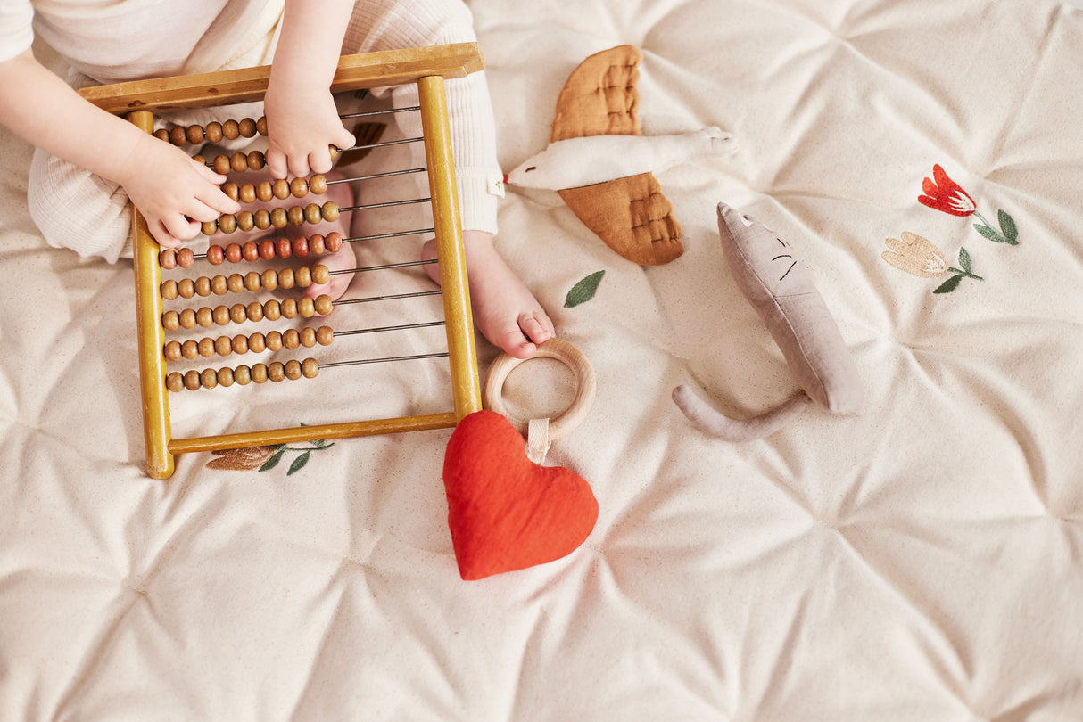 Bestickte Spielmatratze