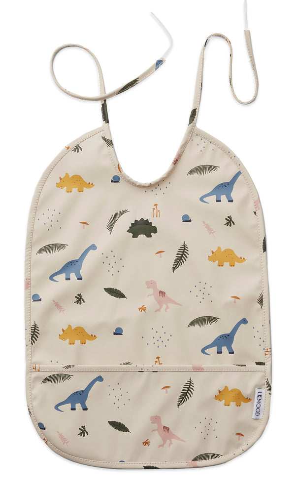 Lätzchen Lai-Dino aus recyceltem Polyester mit wasserdichter Fronttasche von Liewood