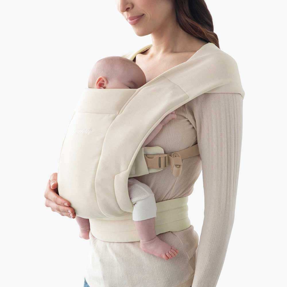 Embrace Neugeborenentrage cream ergonomic newborn carrier by ergobaby soft and comfortable