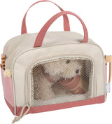 Hund mit Tasche und Pflege-Set