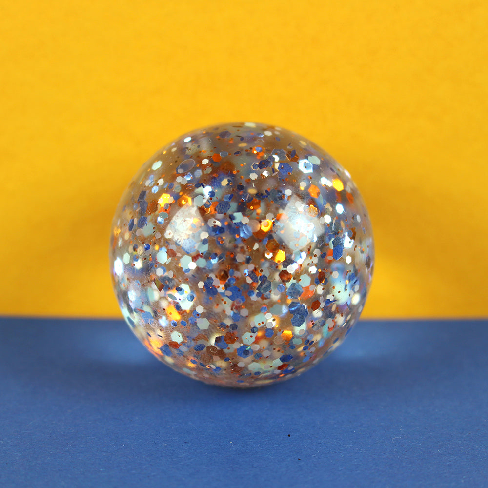 Flummi mit Konfetti/ blau-kupfer