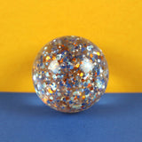 Flummi mit Konfetti/ blau-kupfer