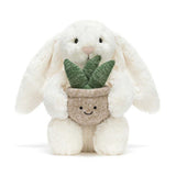 Hase mit Pflanze